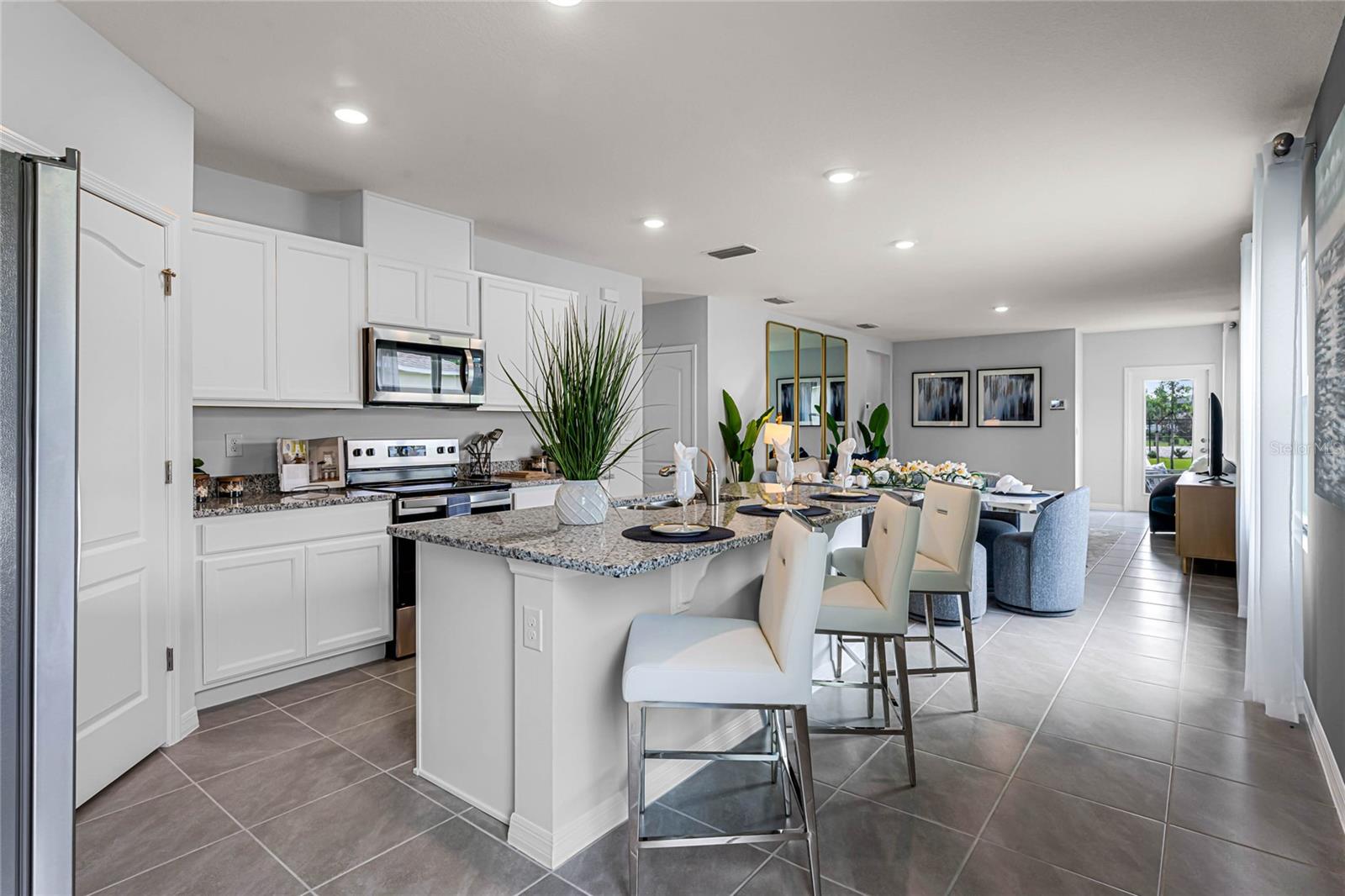 7177 CARIB GRACKLE DR photo 2