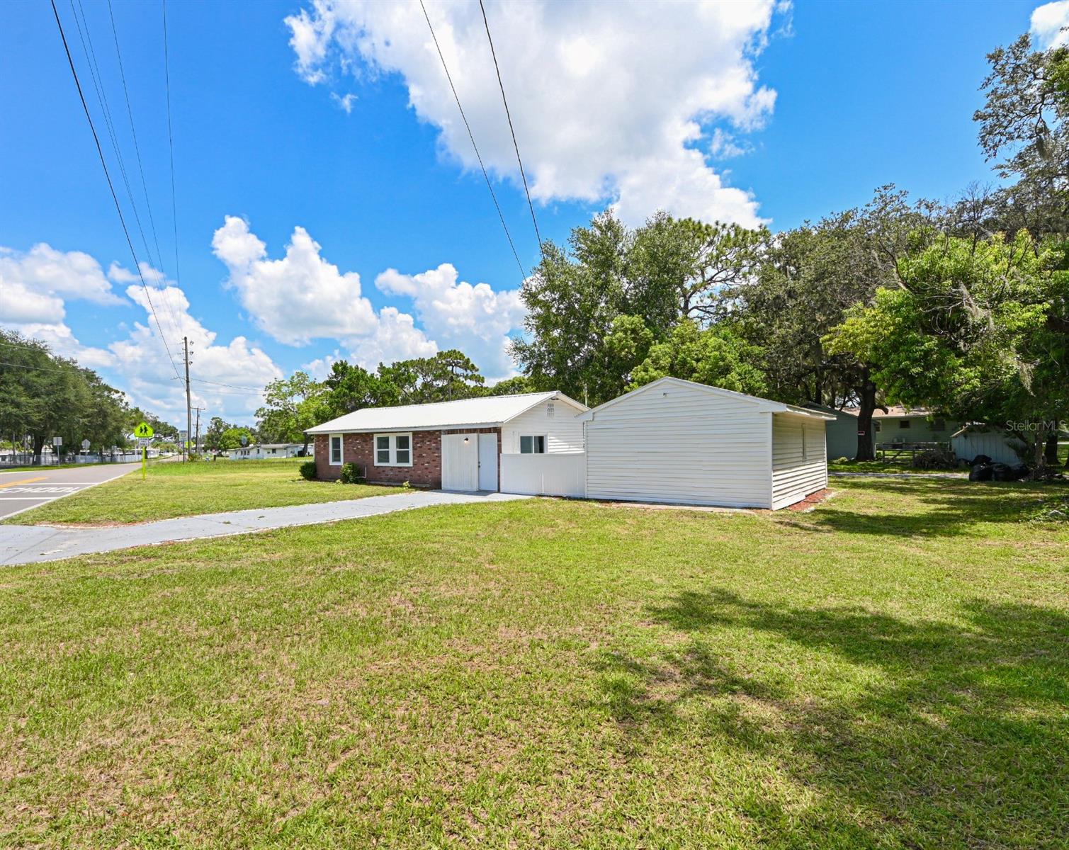 5620 1ST ST photo 2