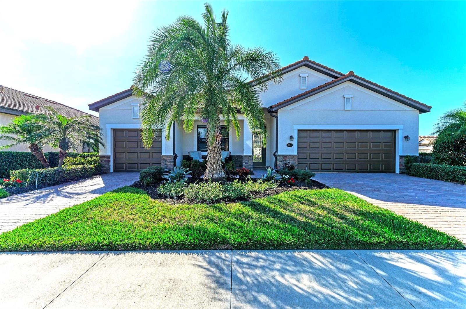 324 WHISPERING PALMS LN — home for sale